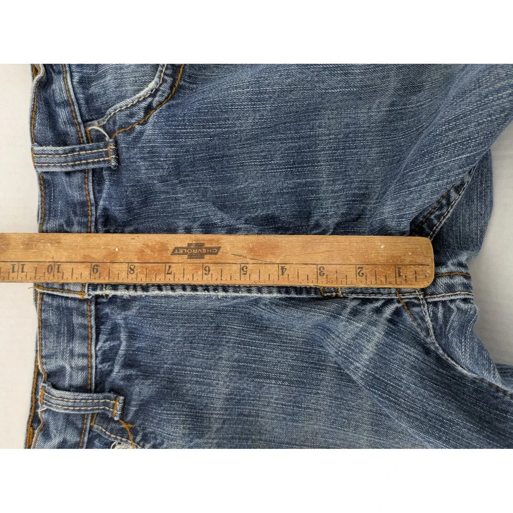 Ariat FR M4 Low Rise Boot Cut Jeans Mens 36x32 Blue Distressed Thrashed Workwear